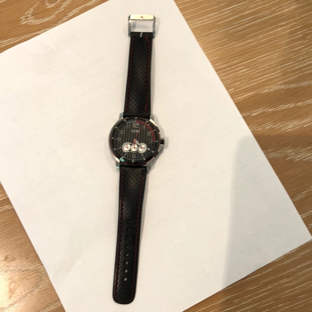 Hugo Boss men’s watch. 1 3/4” face, leather band